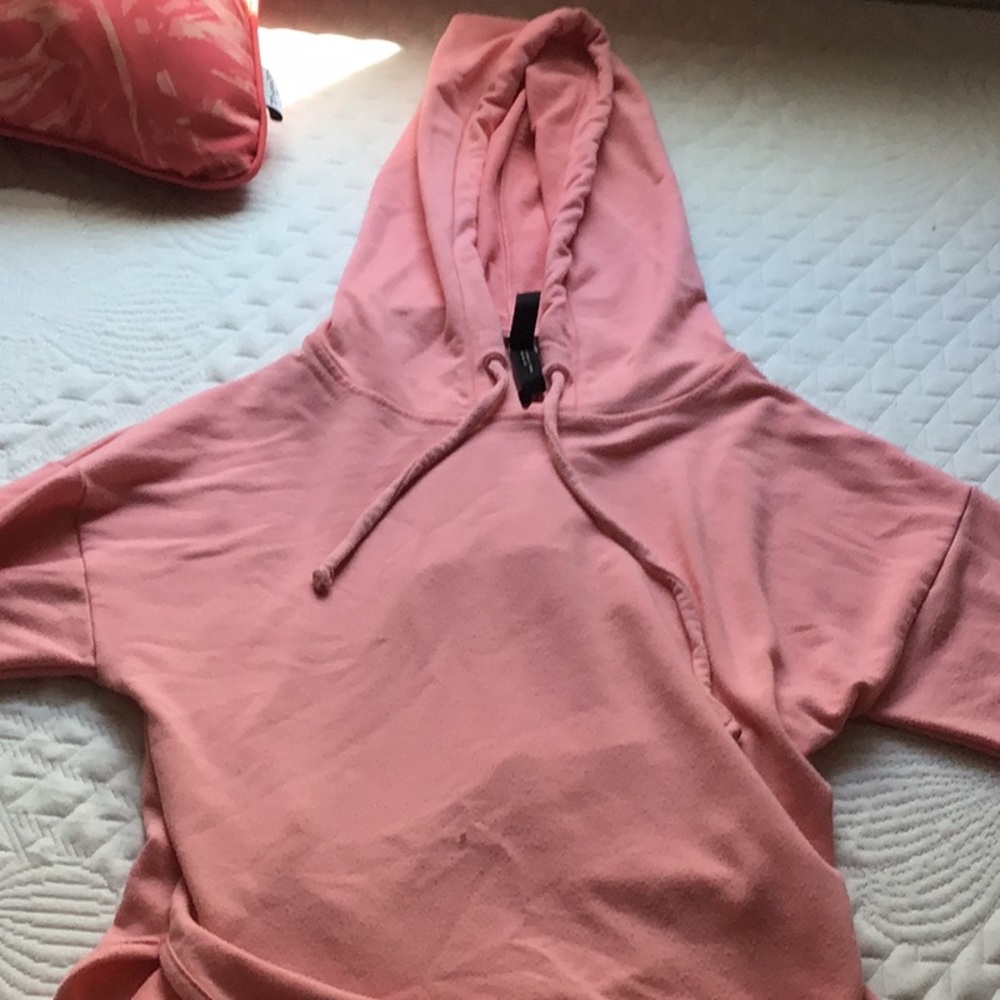 Pink cropped hoodie with cut back